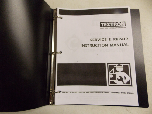 Lextron service and repair instruction manual in a binder.